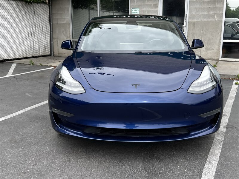 tesla model 3 2018 5YJ3E1EA2JF035857 image tesla model 3 2018 5YJ3E1EA2JF035857 image